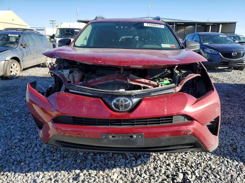 Photo 5 from auction – 2018 TOYOTA RAV4 LE with VIN 2T3BFREV6JW760723