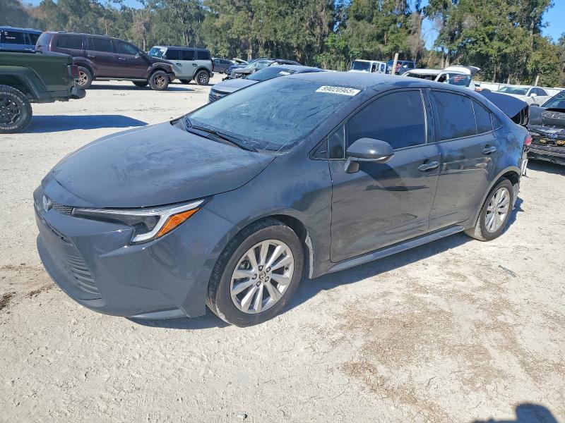 TOYOTA COROLLA LE 2025 with VIN JTDBCMFE3S3086450 - Photo from auction