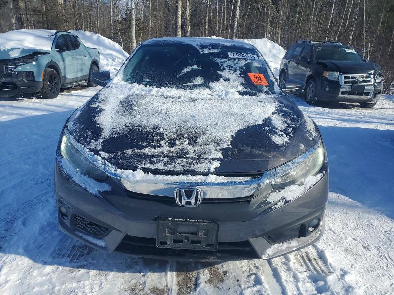 Photo 5 from auction – 2017 HONDA CIVIC with VIN 2HGFC1F99HH105982