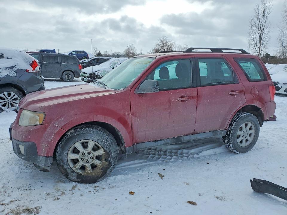 MAZDA TRIBUTE I 2011 with VIN 4F2CY0C78BKM03228 - Photo from auction