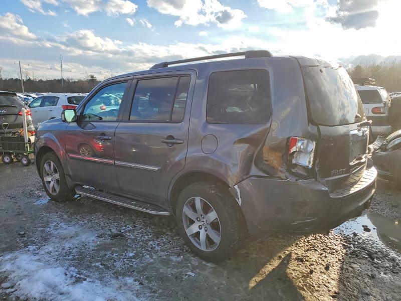 Photo 2 from auction – 2014 HONDA PILOT TOUR with VIN 5FNYF4H96EB012707