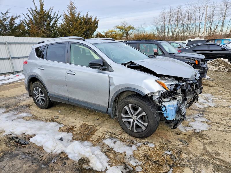 Photo 4 from auction – 2018 TOYOTA RAV4 LE with VIN JTMBFREV2JJ196678