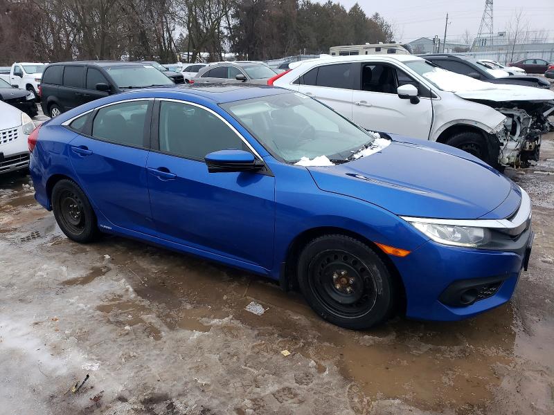 Photo 4 from auction – 2018 HONDA CIVIC EX with VIN 2HGFC1F46JH103262