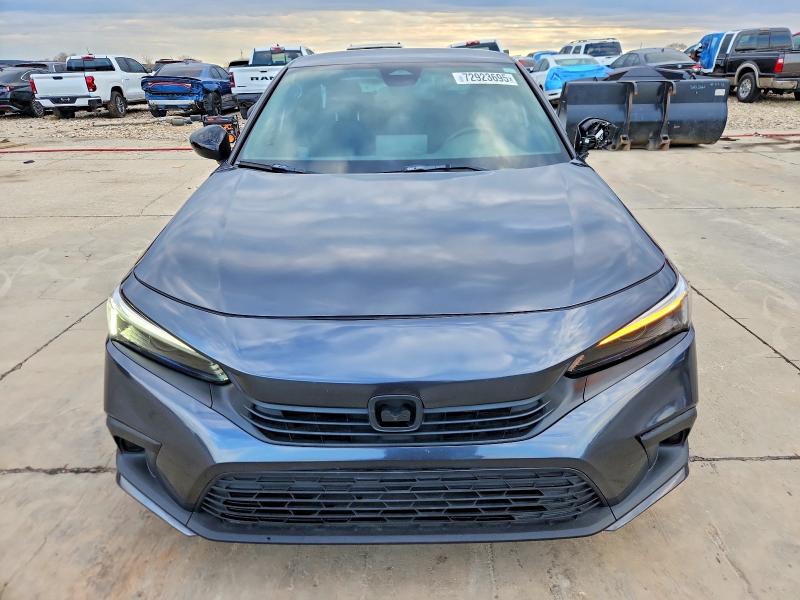 Photo 5 from auction – 2023 HONDA CIVIC SPOR with VIN 2HGFE2F56PH529244