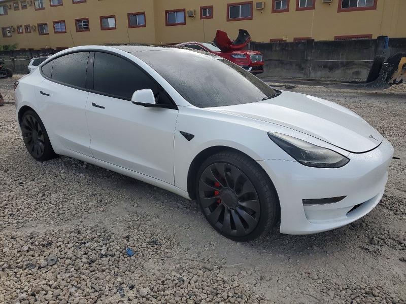 Photo 4 from auction – 2023 TESLA MODEL 3 with VIN 5YJ3E1EC9PF518935