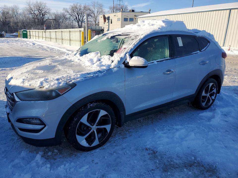 HYUNDAI TUCSON LIM 2016 with VIN KM8J33A24GU034292 - Photo from auction