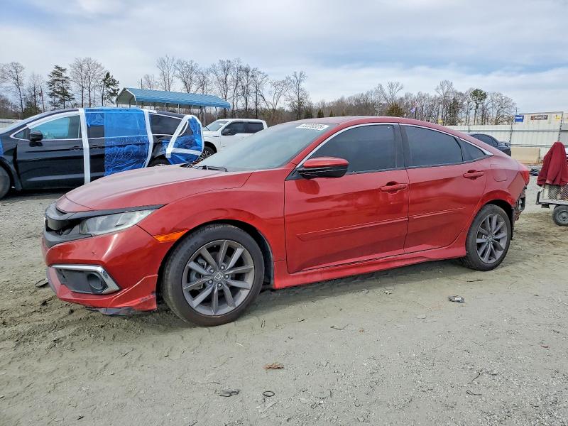 HONDA CIVIC 2019 with VIN 19XFC1F76KE001675 - Photo from auction