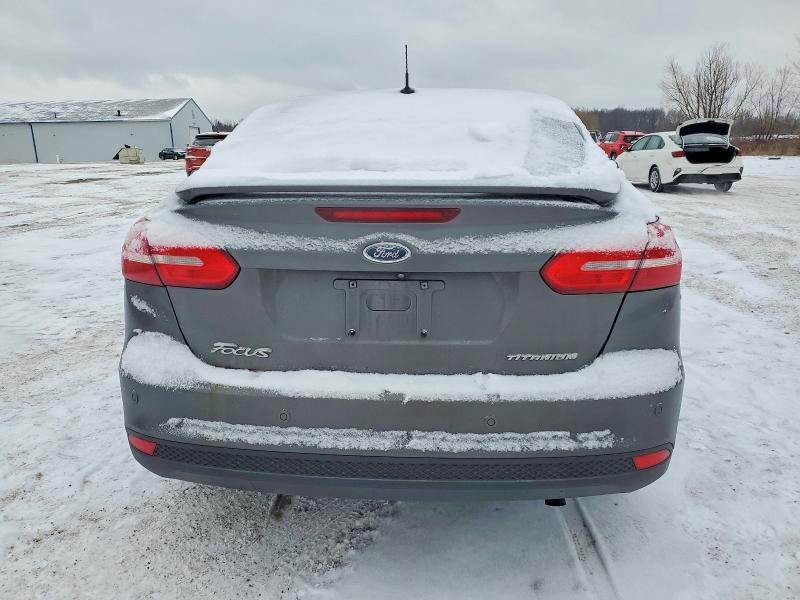 Photo 6 from auction – 2018 FORD FOCUS with VIN 1FADP3J27JL279399