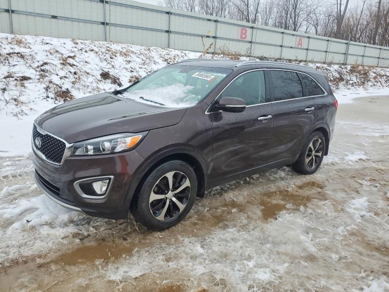 KIA SORENTO 2016 with VIN 5XYPH4A55GG094373 - Photo from auction