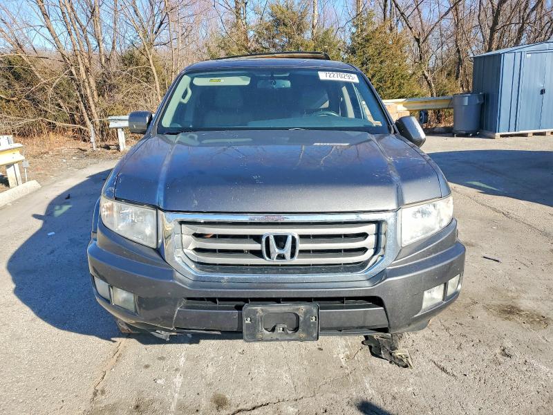 Photo 5 from auction – 2013 HONDA RIDGELINE with VIN 5FPYK1F50DB015781