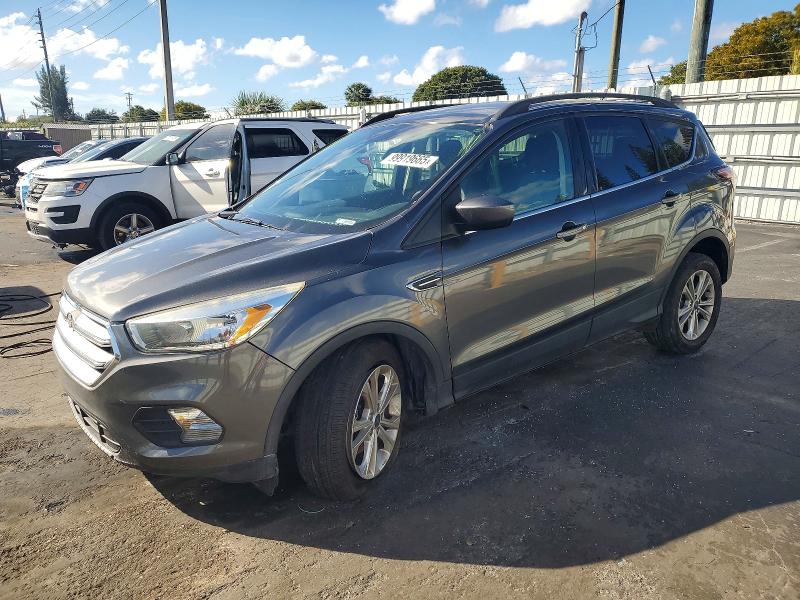 FORD ESCAPE SE 2018 with VIN 1FMCU0GD7JUC17092 - Photo from auction