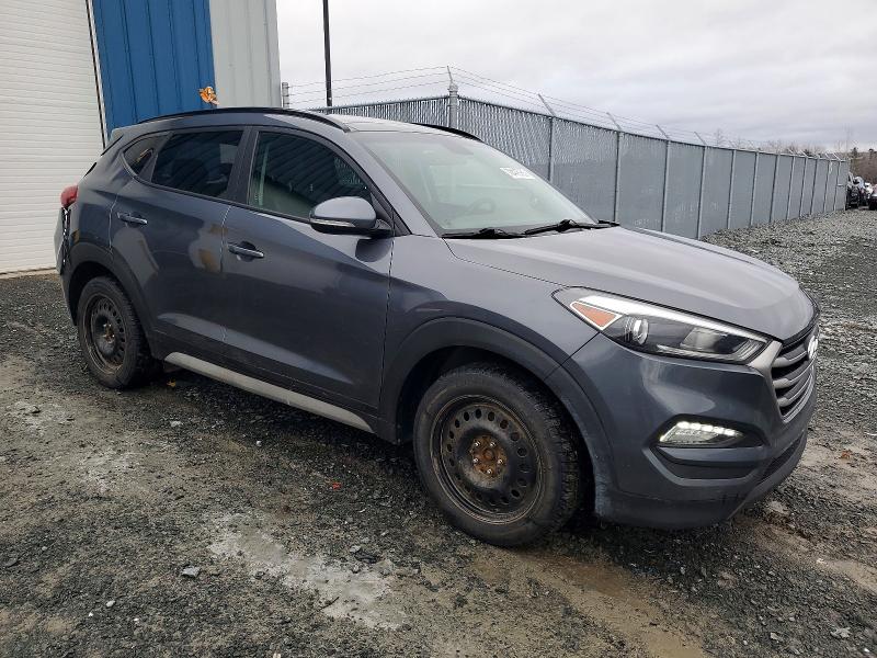 Photo 4 from auction – 2017 HYUNDAI TUCSON LIM with VIN KM8J3CA49HU496639
