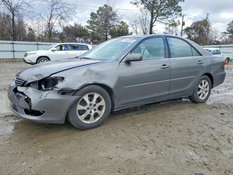 TOYOTA CAMRY LE 2005 with VIN 4T1BF30K85U599090 - Photo from auction