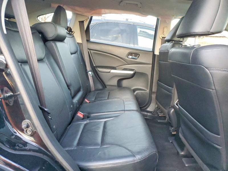 Photo 11 from auction – 2016 HONDA CR-V EXL with VIN 2HKRM4H73GH619502