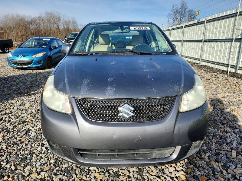 Photo 5 from auction – 2010 SUZUKI SX4 LE with VIN JS2YC5A21A6303588