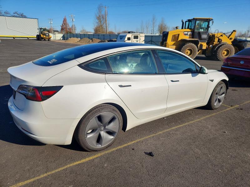 Photo 3 from auction – 2021 TESLA MODEL 3 with VIN 5YJ3E1EA6MF098464