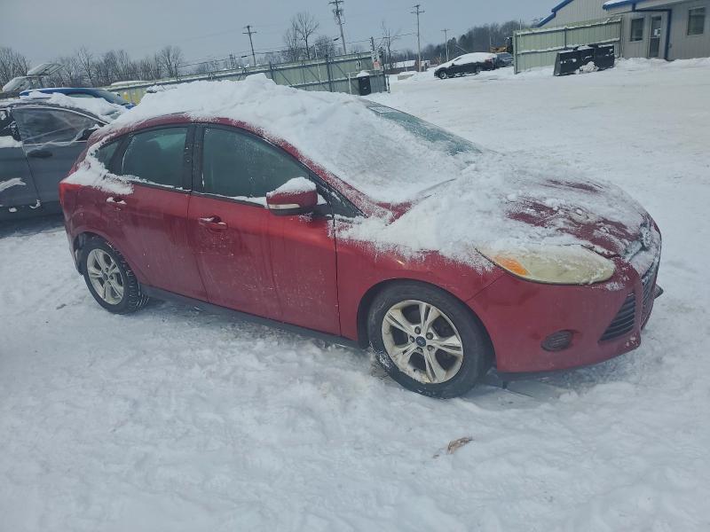 Foto 4 de la subasta – 2014 FORD FOCUS SE con VIN 1FADP3K23EL327002