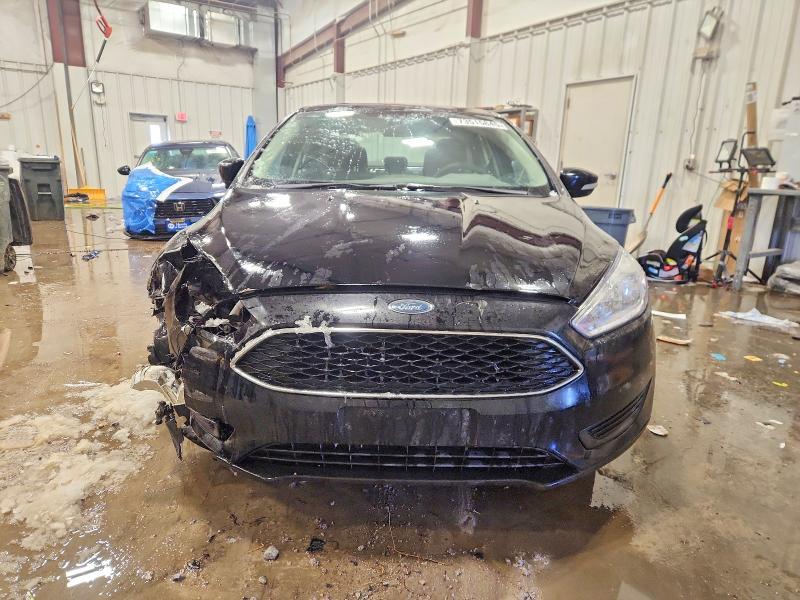 Photo 5 from auction – 2016 FORD FOCUS with VIN 1FADP3F23GL257790