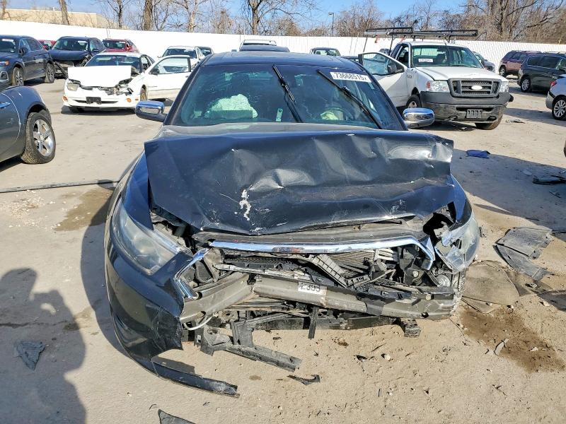 Photo 5 from auction – 2015 FORD TAURUS LIM with VIN 1FAHP2F89FG179958