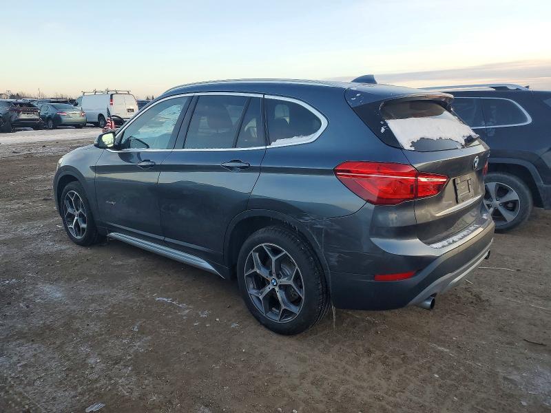 Photo 2 from auction – 2017 BMW X1 XDRIVE2 with VIN WBXHT3C37H5F86654