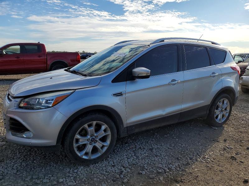 FORD ESCAPE TIT 2016 with VIN 1FMCU9J97GUA69933 - Photo from auction
