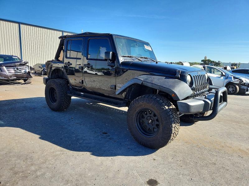 Photo 4 from auction – 2015 JEEP WRANGLER U with VIN 1C4BJWDG9FL611961