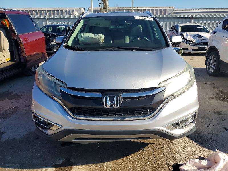 Photo 5 from auction – 2016 HONDA CR-V with VIN 2HKRM3H77GH565101