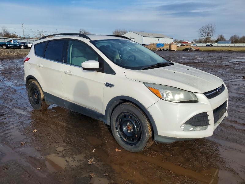 Photo 4 from auction – 2015 FORD ESCAPE SE with VIN 1FMCU9GX6FUB66741