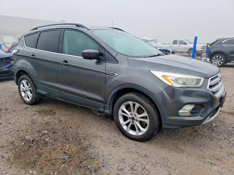 Photo 4 from auction – 2017 FORD ESCAPE SE with VIN 1FMCU9GD6HUD35648