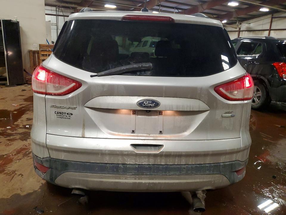 Photo 6 from auction – 2016 FORD ESCAPE SE with VIN 1FMCU9GX0GUA96817
