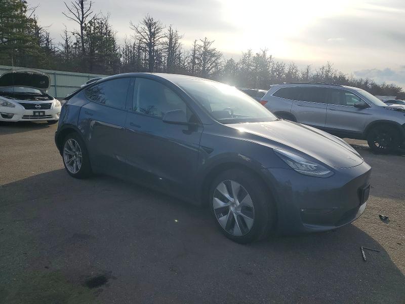 Photo 4 from auction – 2023 TESLA MODEL Y with VIN 7SAYGAEE7PF604569