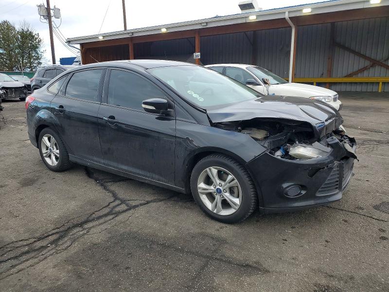 Foto 4 de la subasta – 2014 FORD FOCUS SE con VIN 1FADP3F21EL123390