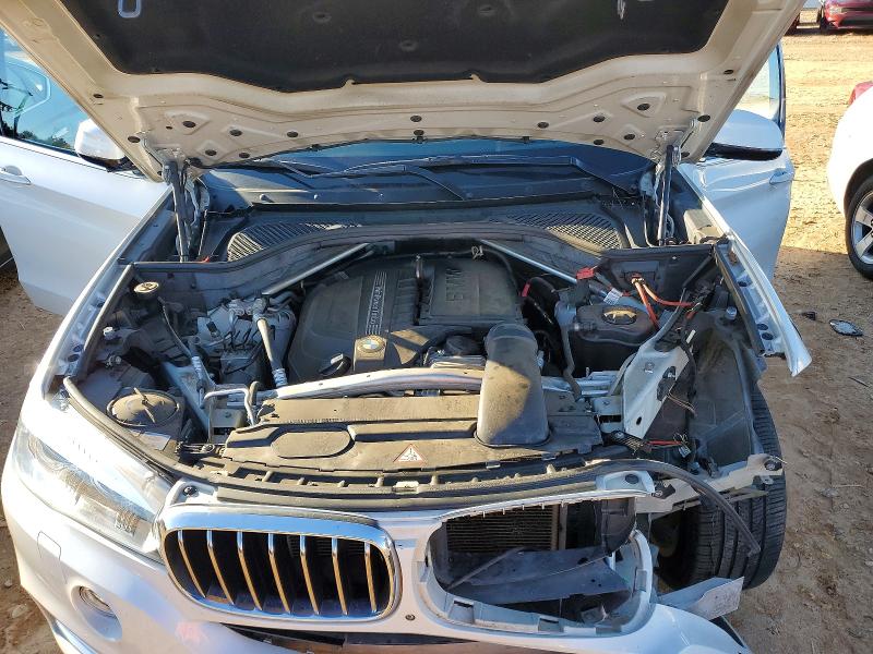 Photo 12 from auction – 2015 BMW X5 XDRIVE3 with VIN 5UXKR0C5XF0P08477