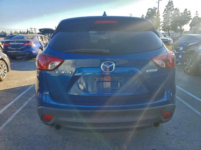 Photo 6 from auction – 2014 MAZDA CX-5 with VIN JM3KE2CY6E0375607