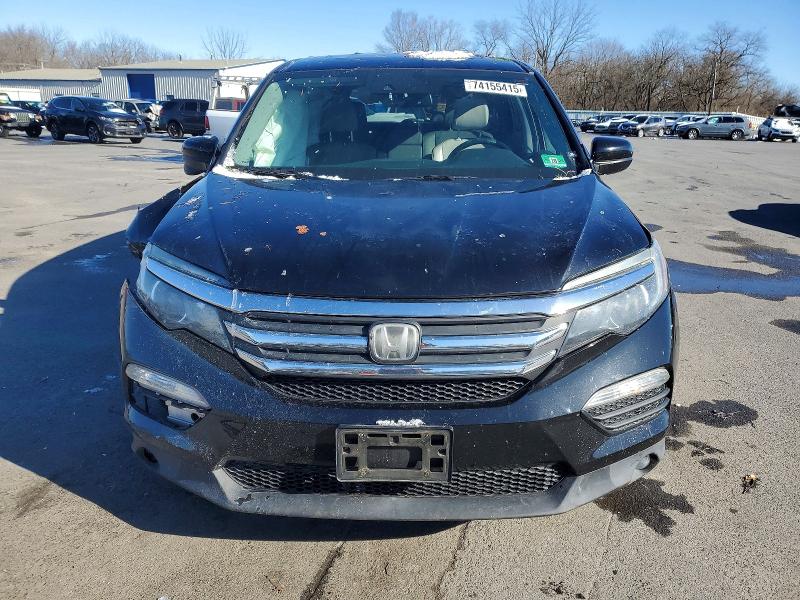 Photo 5 from auction – 2016 HONDA PILOT EXL with VIN 5FNYF6H68GB110156
