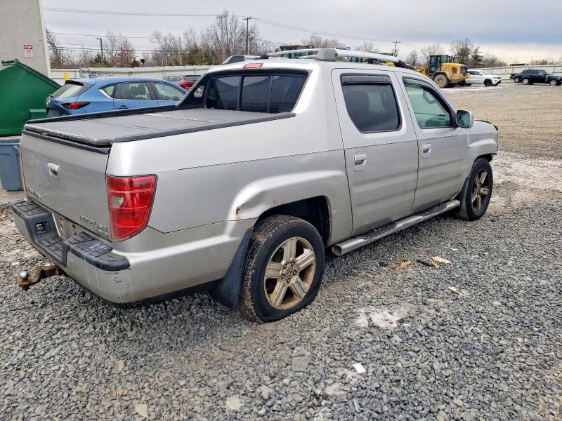 Photo 3 from auction – 2011 HONDA RIDGELINE with VIN 5FPYK1F51BB452315
