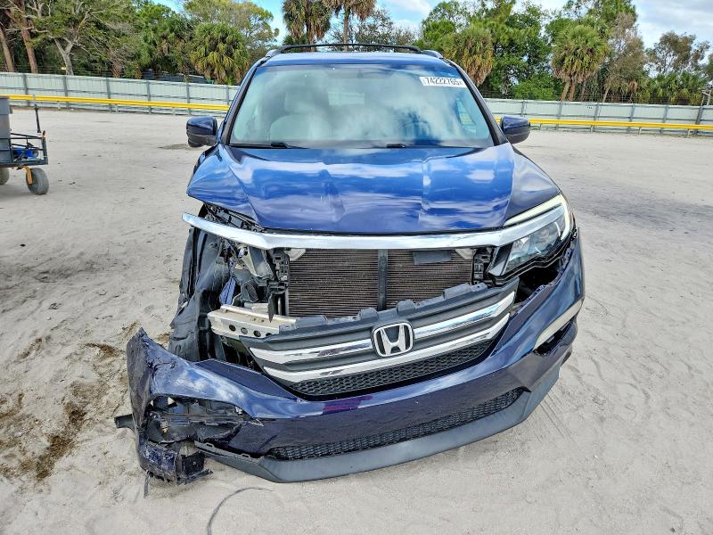 Photo 5 from auction – 2018 HONDA PILOT EX with VIN 5FNYF5H39JB016889