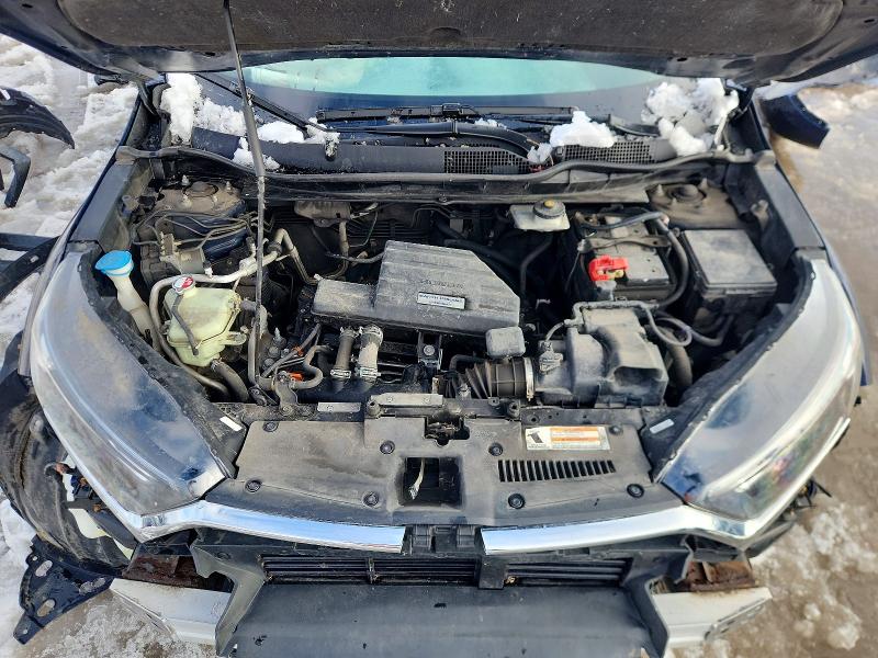 Photo 12 from auction – 2017 HONDA CR-V with VIN 2HKRW1H39HH001155