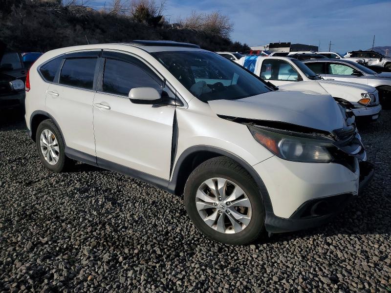 Photo 4 from auction – 2014 HONDA CR-V with VIN 5J6RM4H55EL083458
