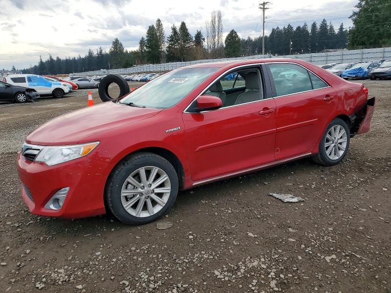 TOYOTA CAMRY HYBR 2014 with VIN 4T1BD1FK2EU101676 - Photo from auction