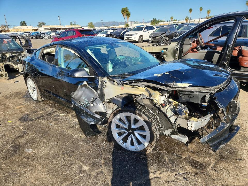 Photo 4 from auction – 2022 TESLA MODEL 3 with VIN 5YJ3E1EA3NF289289