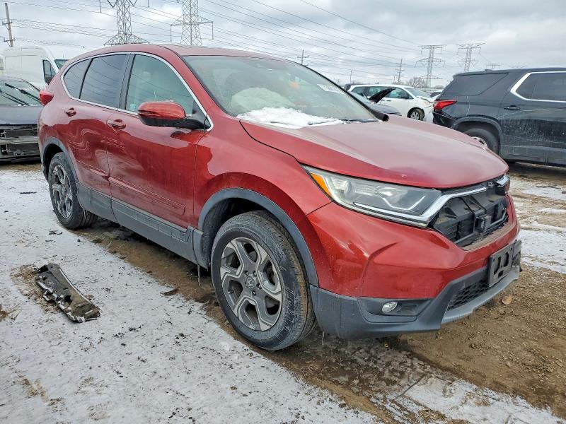 Photo 4 from auction – 2017 HONDA CR-V with VIN 5J6RW2H88HL036650