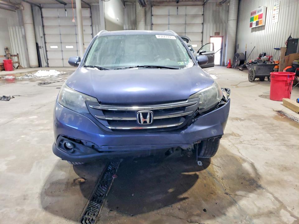 Photo 5 from auction – 2014 HONDA CR-V with VIN 2HKRM4H71EH657694