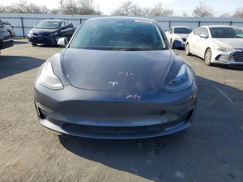 Photo 5 from auction – 2023 TESLA MODEL 3 with VIN 5YJ3E1EB9PF618704
