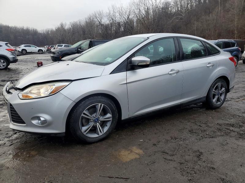 FORD FOCUS SE 2014 with VIN 1FADP3F23EL401660 - Photo from auction