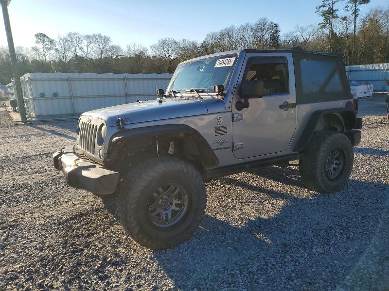 JEEP WRANGLER 2015 with VIN 1C4AJWAG4FL586094 - Photo from auction