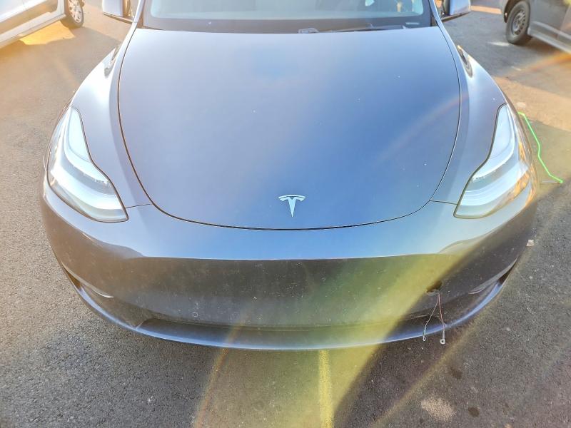 Photo 11 from auction – 2020 TESLA MODEL Y with VIN 5YJYGDEEXLF055121