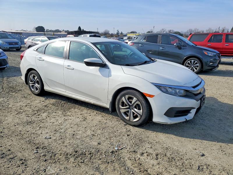 Photo 4 from auction – 2016 HONDA CIVIC LX with VIN 19XFC2F55GE213835