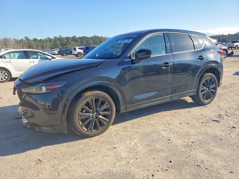 MAZDA CX-5 2022 with VIN JM3KFBAYXN0571405 - Photo from auction