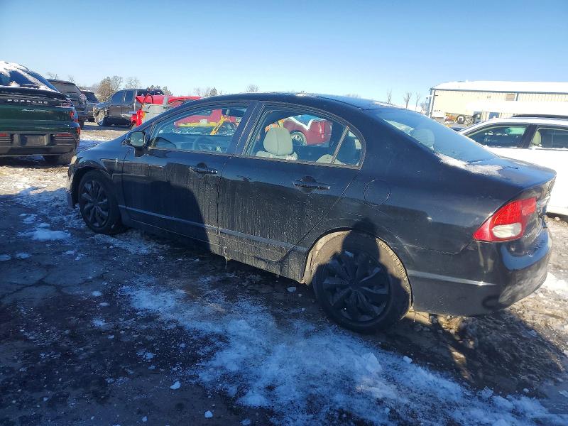 Photo 2 from auction – 2011 HONDA CIVIC LX with VIN 2HGFA1F54BH304187
